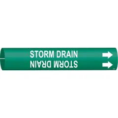 Green snap-on pipe marker with white legend reading 'Storm Drain' and directional arrows. Fits pipe outer diameters from 2-1/2 to 3-7/8 inches. Used to identify storm drain lines in piping systems, aiding in clear content and flow direction marking.