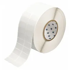 Thermal transfer precut label roll with rubber aggressive adhesive for permanent bonding. Measures 3/4 in x 1 1/2 in. Compatible with i7100 printer series. Used for industrial identification, asset tracking, and compliance labeling on challenging surfaces such as plastics, powder-coated metals, and textured materials.