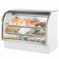 White curved glass display merchandiser with four shelves. Suitable for deli, prepared foods, and grab-and-go applications in food service and retail settings