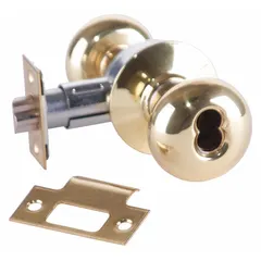 This ARROW office knob lockset features a Tudor-style trim and is constructed of brass. It is designed for interior commercial doors requiring secure latching and privacy. Suitable for office environments.
