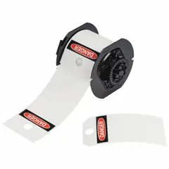 Pre-cut polyester danger tags on a roll, each measuring 5 3/4 in x 3 1/4 in, white, with 100 tags per roll. Designed for indoor and outdoor use, these tags are compatible with the BBP35 printer series and require the B30-R10000 ribbon for printing. Commonly used for industrial safety labeling to warn personnel of hazardous conditions.