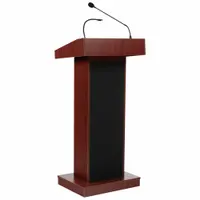 This sound lectern is constructed of laminate with a mahogany finish and features a 12-inch shelf, a document rail, and an integrated wireless headset microphone sound system. It includes a battery and is designed for clip-on or mounted use. Suitable for public speaking, presentations, conferences, lectures, and ceremonies where a portable amplified podium is needed