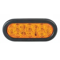 This LED turn signal light features an amber oval lens and a grommet mount for permanent installation. It connects via a wire harness and complies with FMVSS 108 standards. Typical applications include indicating turning direction on vehicles such as trucks, emergency vehicles, and industrial equipment