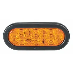 This LED turn signal light features an amber oval lens and a grommet mount for permanent installation. It connects via a wire harness and complies with FMVSS 108 standards. Typical applications include indicating turning direction on vehicles such as trucks, emergency vehicles, and industrial equipment.