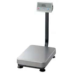 This shipping bench scale features a column-mounted indicator and a 430 stainless steel weighing surface 20 7/8 inches deep. It offers readability of 0.02 lb/0.01 kg and supports kg, lb, and oz units. An RS-232C port enables data communication. Typical applications include weighing parcels and freight in logistics and warehouse environments.