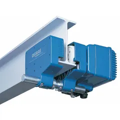 Motorized trolley for hoists with 4,840 lb max hoist load capacity. Operates on 575V AC power with travel speeds of 20/80 fpm. Tapered design, cast aluminum construction. Used to move hoists along beams for precise load positioning in material handling applications.