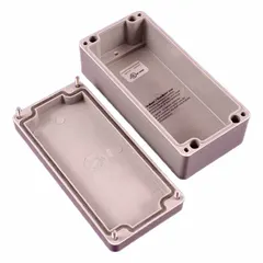 This nonmetallic enclosure is constructed of polyester and measures 6 in x 2 in x 2 in. It features a solid cover secured by screws and is rated NEMA 4/4X for protection against water ingress and corrosion. Suitable for housing electrical components in wet or washdown environments.