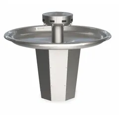 This BRADLEY Sentry Series wash fountain is a sensor-operated, circular unit made of stainless steel with a silver finish. It has a 54-inch overall width and features a central rising drain. The design is ADA compliant, making it suitable for high-traffic commercial restrooms where multiple users can wash simultaneously.
