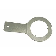 Galvanized steel foot button nozzle for water activation and 1/4 turn wrench for servicing valve components. Used in wash fountain repair and maintenance for commercial or industrial restroom facilities.