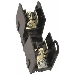 This BUSSMANN fuse block is a 1-pole, non-indicating unit rated 600 V AC. It features an open block design with pressure-plate terminals for secure wire connections. Designed for UL Class J fuses, it is commonly used in industrial control panels, motor branch circuits, and power distribution systems requiring high interrupting capacity.