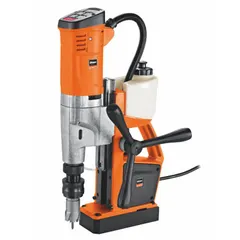 This standard magnetic drill press features an electric magnet for secure attachment to ferrous surfaces. It operates on 120V AC and provides a drill travel of 5 5/16 in. Typical applications include on-site hole cutting in steel fabrication and structural steel work.