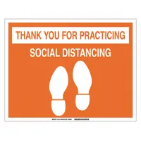 This vinyl floor sign features an orange background with a thank-you message for practicing social distancing. It is not retroreflective and measures 14 inches by 18 inches. Suitable for placement on floors in work areas, aisles, and common zones to reinforce safe spacing