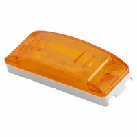 Rectangular amber clearance light with incandescent lighting and bracket mount. Features a male pin connector and SAE P2 lens code. Used on trucks, trailers, and heavy equipment for side and rear marker lighting to indicate vehicle width and height