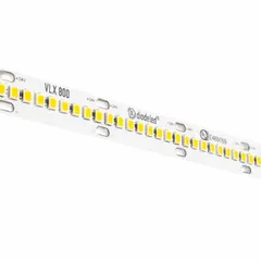 This 100-foot spool of white LED tape light operates at 24V DC, delivering 323 lumens per foot at 3000K color temperature. Consuming 2.8 watts per foot, it is dimmable and features a top bend design for flexible installation. Suitable for architectural accents, under-cabinet lighting, and cove lighting.
