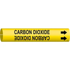 Yellow snap-on pipe marker with black legend reading 'Carbon Dioxide' and directional arrows. Fits pipe outer diameters from 1-1/2 to 2-3/8 inches. Used to identify carbon dioxide lines in industrial piping systems for safety and compliance.