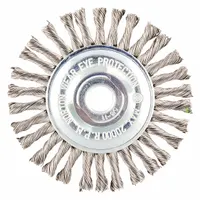 Twisted stainless steel wire wheel brush for heavy cleaning of contoured stainless steel surfaces. 4" diameter, 1/4" width, 5/8" arbor hole. Removes rust, scale, and weld splatter without contaminating the workpiece