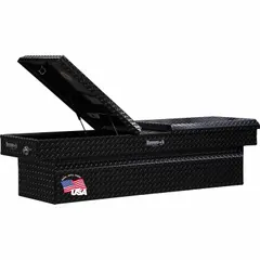 This crossover box features a gull wing lid that opens from both sides, providing convenient access to stored items in tight spaces. With a 71 in overall width and gloss black finish, it mounts behind the cab for organized storage of tools and equipment.