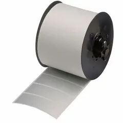 Precut label roll with destructible tamper-indicating 'Checker Board' pattern. Designed for use with MiniMark printer series. Leaves visible footprint if tampered, suitable for security labeling and asset tracking in industrial environments.