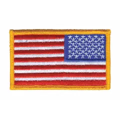Embroidered emblem featuring a U.S. Flag design with a gold border. Measures 3 3/8 inches by 2 inches, made of plastic, and attaches via sew-on method. Suitable for displaying on uniforms, bags, or apparel in military, law enforcement, or patriotic contexts.