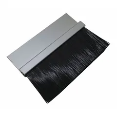 This polypropylene brush seal is designed for material handling and industrial door applications. It features a 2 in brush length and 1 1/2 in holder length with a staggered width type to seal uneven surfaces. Includes self-drilling fasteners for installation. Commonly used on garage doors, loading docks, and warehouse entryways to block drafts, dust, and pests.