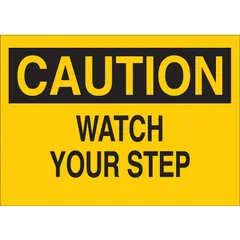 Polyester caution sign with adhesive mounting for indoor floor marking. Nominal size 3 1/2 in x 5 in. Not retroreflective, not glow-in-the-dark, no anti-slip surface. Suitable for dry areas where step hazard warnings are needed under ambient light.