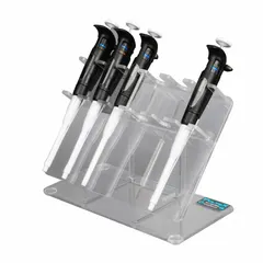 Benchtop pipette stand constructed of clear PETG with rubber components. Holds up to six pipettes in an upright position for organized storage and easy access during laboratory workflows. Overall height 8 5/8 inches, length 6 inches.