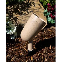 Incandescent outdoor flood and accent light rated for 100 W at 120V AC. Black housing with overall length of 5 1/2 inches and width of 3 7/8 inches. No lamp included. Suitable for directional illumination in landscape or architectural applications.