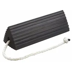 Single black rubber wheel chock with overall dimensions of 14 1/2 in length, 5 1/4 in width, and 5 1/4 in height. Used to secure aircraft and heavy vehicles during parking, maintenance, or loading on tarmacs or industrial floors.