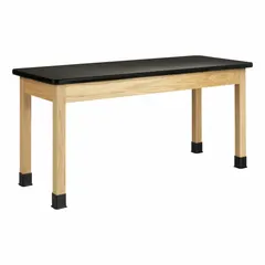 This fixed-height lab table features a black laminate countertop with an oak wood apron. The laminate surface provides a cleanable work area suitable for laboratory, classroom, and light-duty technical environments. Overall dimensions: 5 ft length, 24 in width, 30 in height.