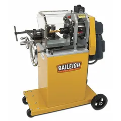 Electric pipe and tube notcher for cutting saddle-shaped notches in tubing. Compatible pipe size range from 1 in to 3 in. Used in metal fabrication for preparing joints in handrails, frames, and structural assemblies.