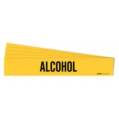Pipe marker with yellow background and black legend text reading 'Alcohol'. Fits pipe outer diameters from 2-1/2 to 7-7/8 inches. Supplied without directional arrows. Used for identifying pipes carrying alcohol in industrial piping systems.