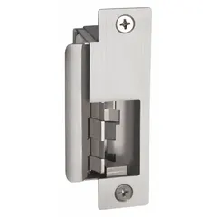 This HES mortise electric strike is constructed of stainless steel and measures 1 1/4 in wide by 4 7/8 in high. It operates on 24V AC/DC input and is rated for heavy-duty performance. Used in access control systems to release a door latch electronically, it is installed in commercial or industrial door frames for secure entry point management.