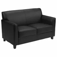This loveseat features a black faux leather upholstery with a wood frame. It offers a 42-inch seat width and 19 1/2-inch seat depth, suitable for compact seating in living rooms, waiting areas, or office reception spaces