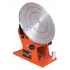 Fixed-speed rotary welding positioner with turntable. Vertical load capacity of 200 lb and maximum tilt angle of 90°. Used to rotate and position workpieces for welding operations in fabrication and repair settings.