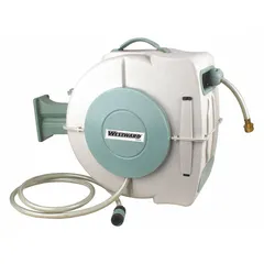 Enclosed garden hose reel with spring-return mechanism for automatic retraction. Includes 65 ft of 1/2 in I.D. hose. Features 3/4 in FNPT inlet and outlet connections. Maximum operating pressure 150 psi. Green housing.