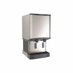 This combination ice machine and dispenser produces 500 lb of nugget ice per day with water-cooled operation. It measures 41 in H x 23 1/4 in W x 27 1/8 in D and includes an infrared sensor for automatic dispensing. Suitable for commercial kitchens, healthcare facilities, and hospitality settings where self-service ice is required.