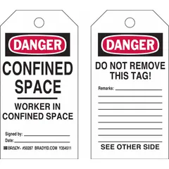 White write-on-surface tags with black/red/white danger and confined space markings, including fields for signature and date and a 'Do Not Remove This Tag' notice. Each tag has a cable-tie fastener. Pack of 25. Used to mark confined space entry points and warn of hazards.