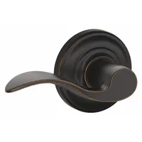 Passage lever lockset for interior doors not requiring locking, such as hallways, closets, or restroom entrances. Features an Andover style lever in Aged Bronze and Brass finish. ANSI F75 function allows free rotation from either side for high-traffic areas. Not ADA compliant or ligature-resistant