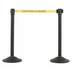 This retractable belt barrier system includes two yellow round sloped posts with black caution messaging and two bases. Each post has a 38 1/2 in height and a 77 in retractable belt. Used for crowd control and safety delineation in industrial facilities, warehouses, and public spaces.
