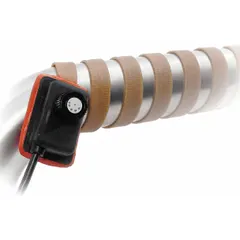 Flexible silicone rubber heating tape for freeze protection and process temperature maintenance on glass or metal surfaces. Reusable, ungrounded, with integral controller. 8 ft length, 1/2 in width, 1/8 in thickness.