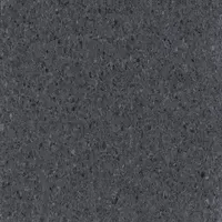 This vinyl composition tile (VCT) features a smooth finish and Crown Texture pattern in Charcoal. Each tile measures 12 inches in width. Suitable for commercial and industrial flooring applications requiring a durable, easy-to-maintain surface