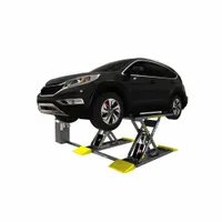 Hydraulic scissor lift with two runways for vehicle alignment and undercar access. Steel construction supports cars up to 6,000 lb. Powered by a control box actuator. Suitable for tire, brake, and suspension service in automotive workshops