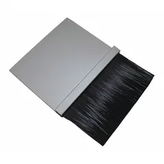 This polypropylene brush seal features a staggered width type and pre-punched slotted holes in the holder for mounting. It is used in material handling and industrial door applications to block drafts, dust, and pests, providing effective sealing on uneven surfaces.