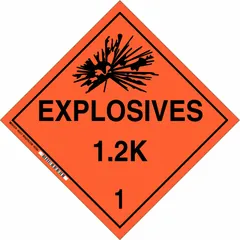 Class 1 explosives placard measuring 10 3/4 in x 10 3/4 in with message 'Explosives 1.2 K 1'. Used for identifying containers transporting or storing explosive materials, meeting DOT placarding requirements.