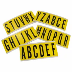 This repositionable letter set includes black Gothic characters A to Z on a yellow non-reflective background. Each character is 3 inches tall and die-cut for easy application. Designed for indoor use, the set is not self-spacing or aligning. Suitable for facility signage, equipment identification, and general labeling tasks.