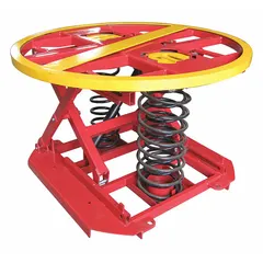 Weight-actuated self-leveling pallet positioner with 4,400 lb load capacity and 27 3/4 in raised height. Automatically adjusts working height as loads are added or removed, reducing worker strain in material handling tasks such as loading, unloading, and assembly operations.
