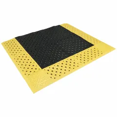 Standard drainage mat with diamond tread pattern in black with yellow border. Made of PVC, 7/8 in thick, not reversible. Suitable for wet or oily areas to reduce fatigue and improve slip resistance.