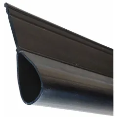 This brush seal is used in material handling applications to seal gaps around garage doors, preventing dust, debris, and drafts. It features a 1-1/2 inch brush length made of PVC and includes a Dual Durometer construction for effective sealing in industrial and commercial environments.