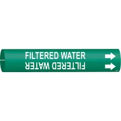 Green snap-on pipe marker with white legend reading 'Filtered Water' and directional arrows. Fits pipe outer diameters from 3/4 to 1-3/8 inches. Used to identify filtered water lines in plumbing, HVAC, and process piping systems.
