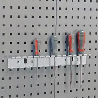 This steel toolholder with a powder-coated gray finish is designed for surface mounting and includes a screwdriver rack. It features a locking clip system to secure screwdrivers in place. Typical applications include organizing screwdrivers in workshops, maintenance areas, and industrial workstations